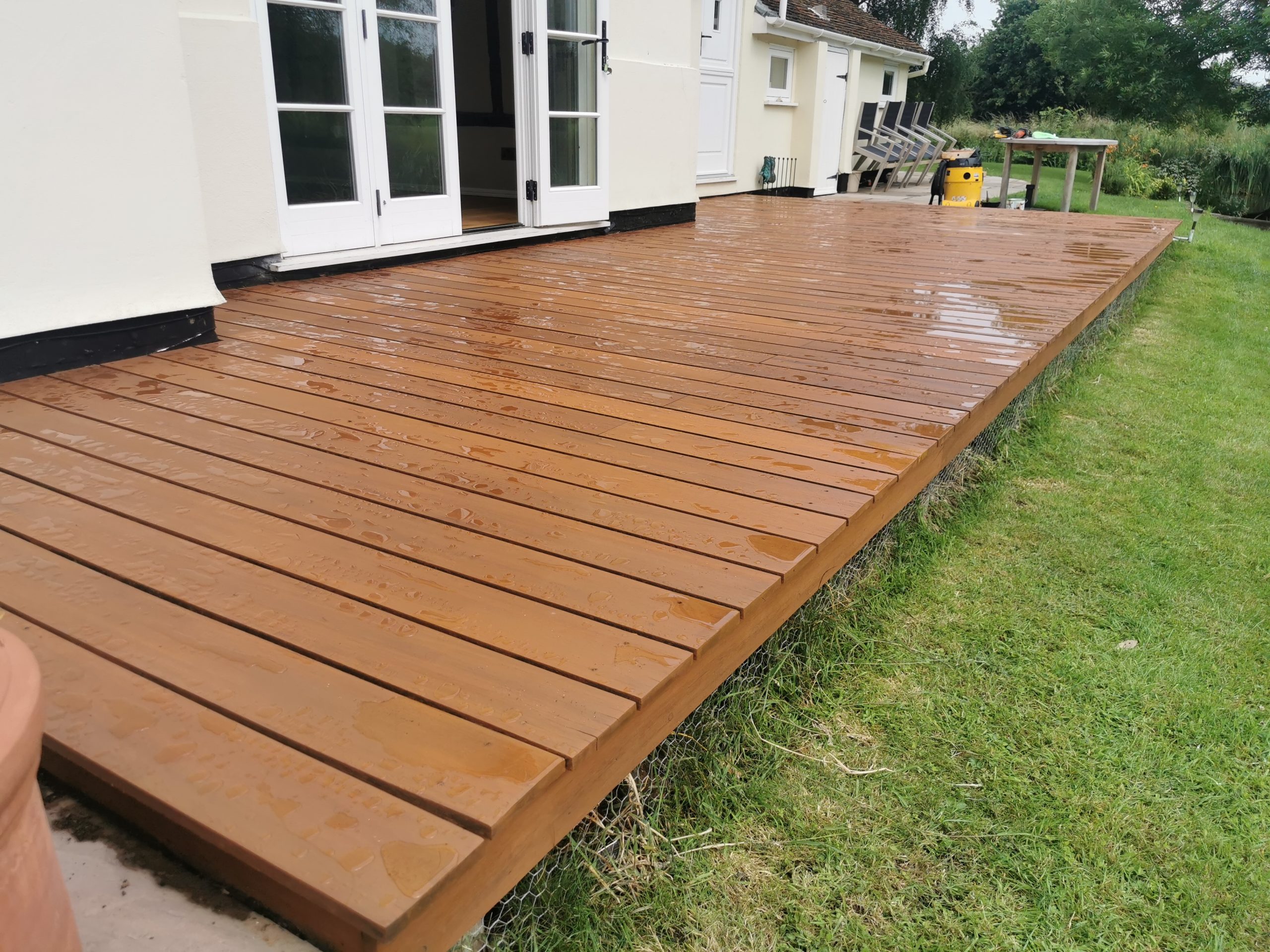 Large timber decking installed next to house