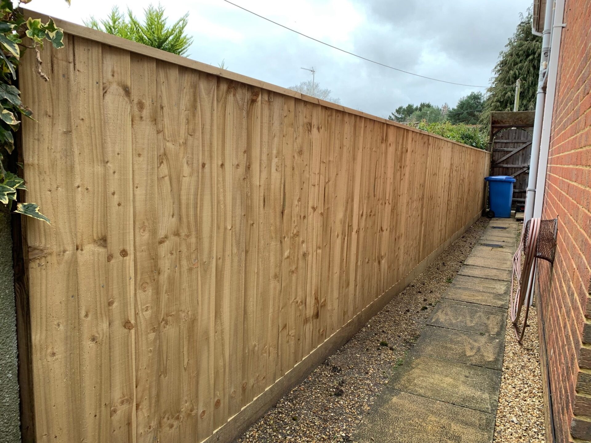 New fence panels along side passage